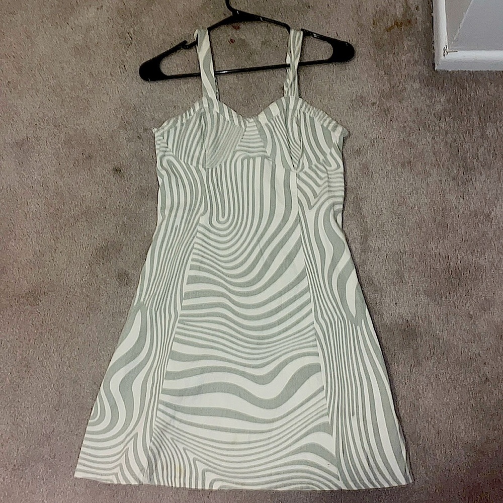 This dress is a size medium, worn once, the brand is sincerely jules.